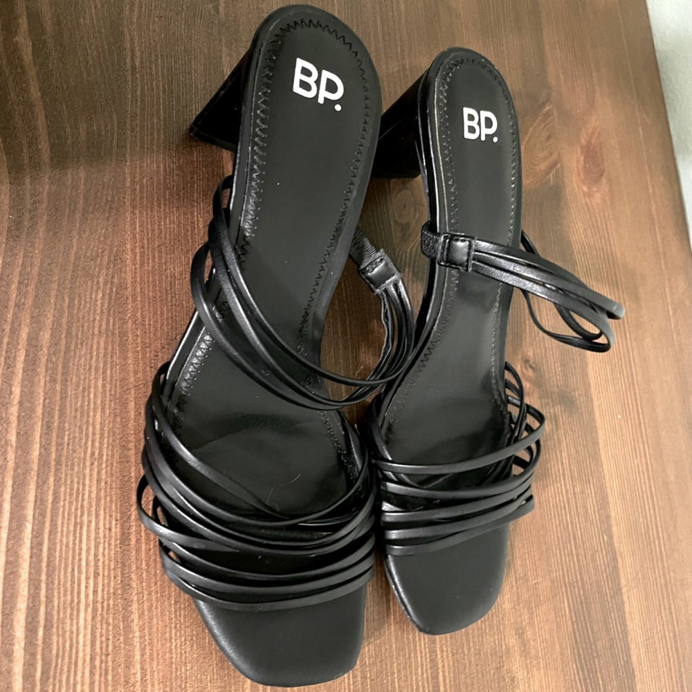Black strappy slide sandal heel